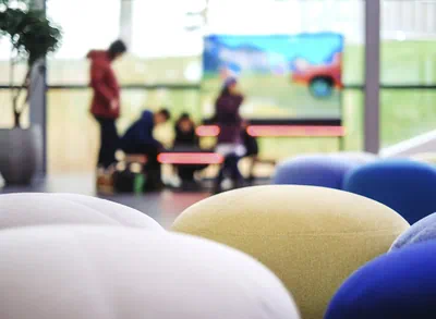 Young people blurred in the Volkwagen Pavilion