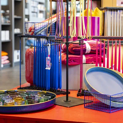 Colorful candles and glasses presented in the store